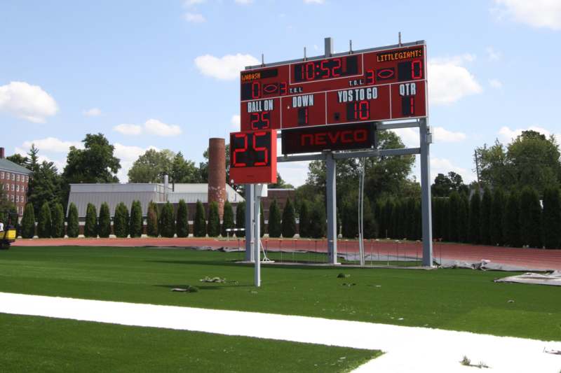 a scoreboard on a sports field