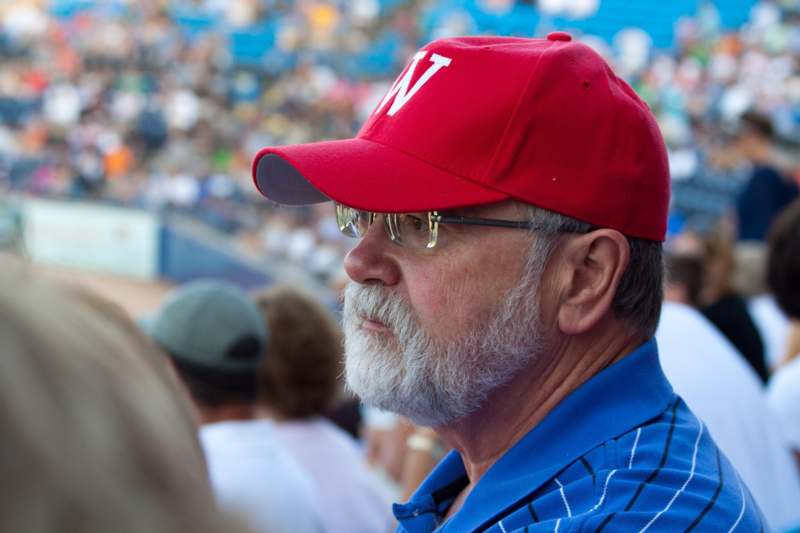 a man wearing a red hat