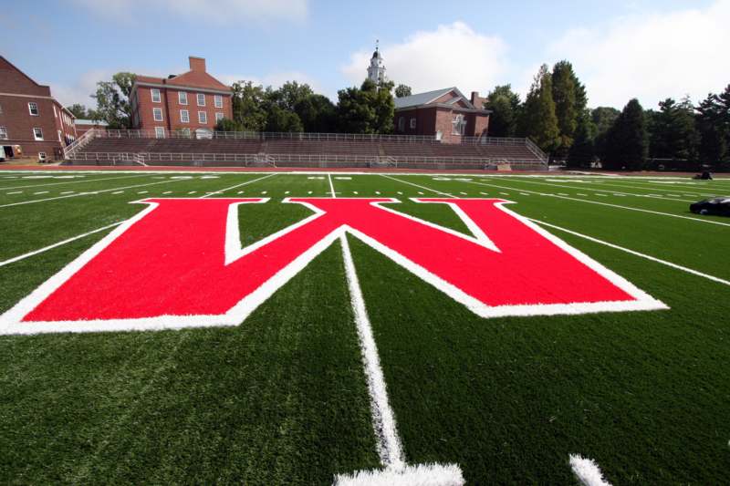 a football field with a red letter on it