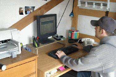 a man using a computer