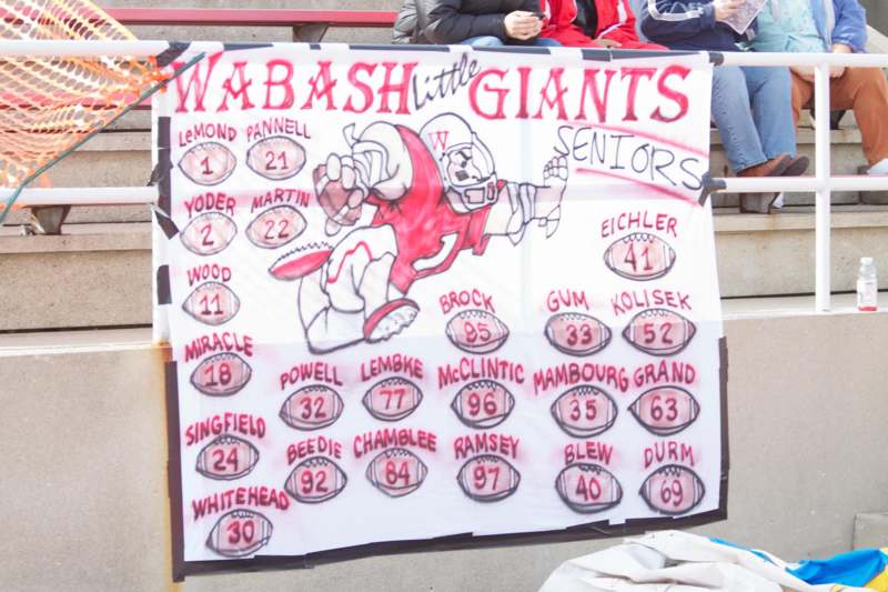 a banner with football players on it