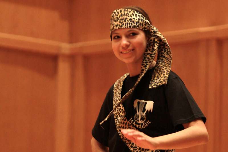 a woman wearing a leopard headband