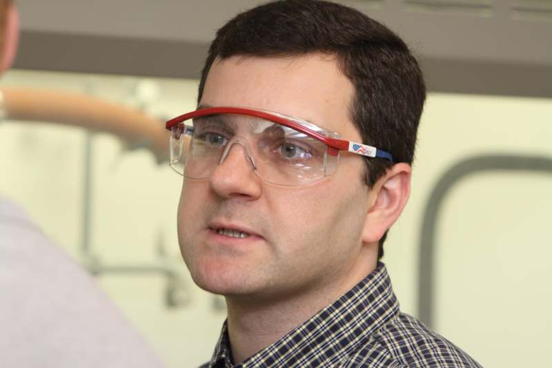 a man wearing safety glasses