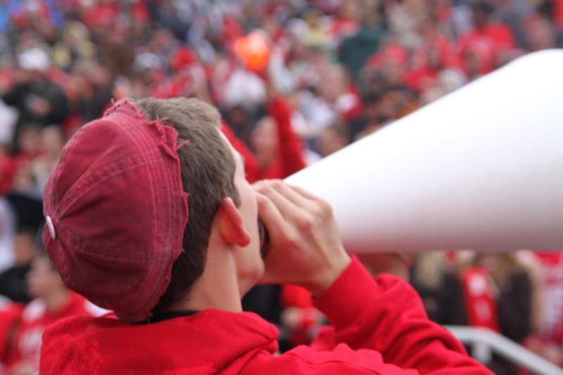 a boy holding a megaphone