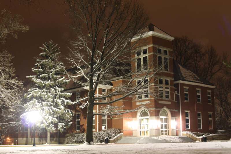 a building with snow on the ground