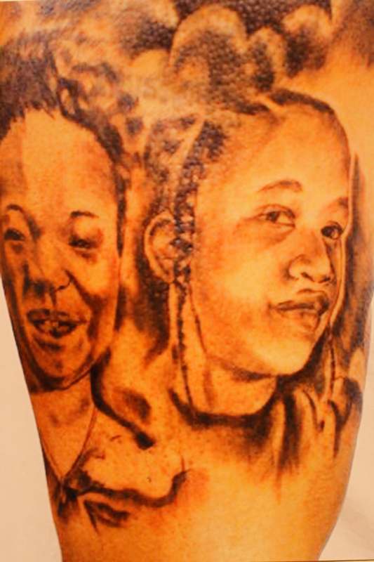 a tattoo of two people