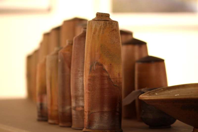 a group of brown ceramic objects