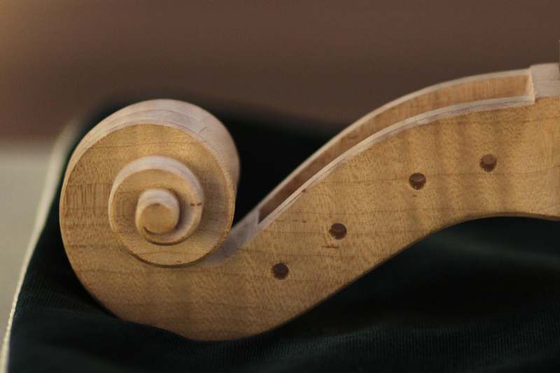 a close up of a wooden object