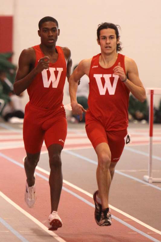 two men running on a track