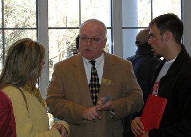 a man talking to a woman