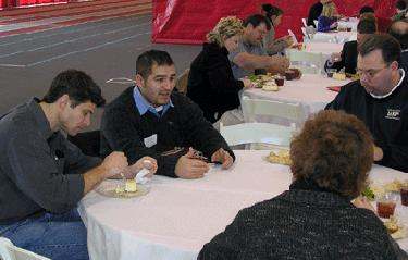 a group of people sitting at tables