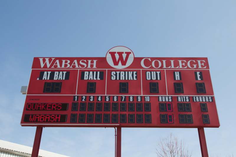 a scoreboard with a baseball game