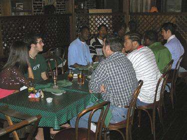 a group of people sitting at a table