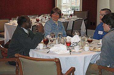 a group of people sitting at a table