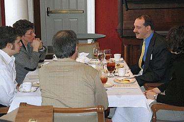 a group of people sitting at a table