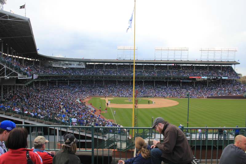 a baseball stadium with people watching
