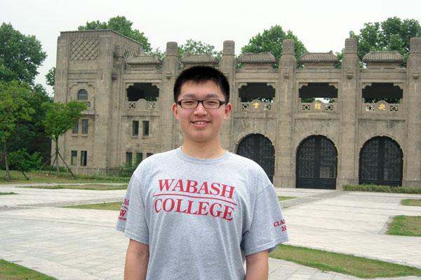 a man standing in front of a building