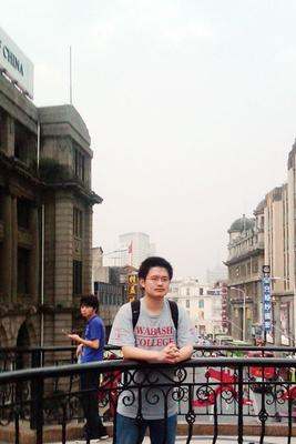 a man leaning on a railing