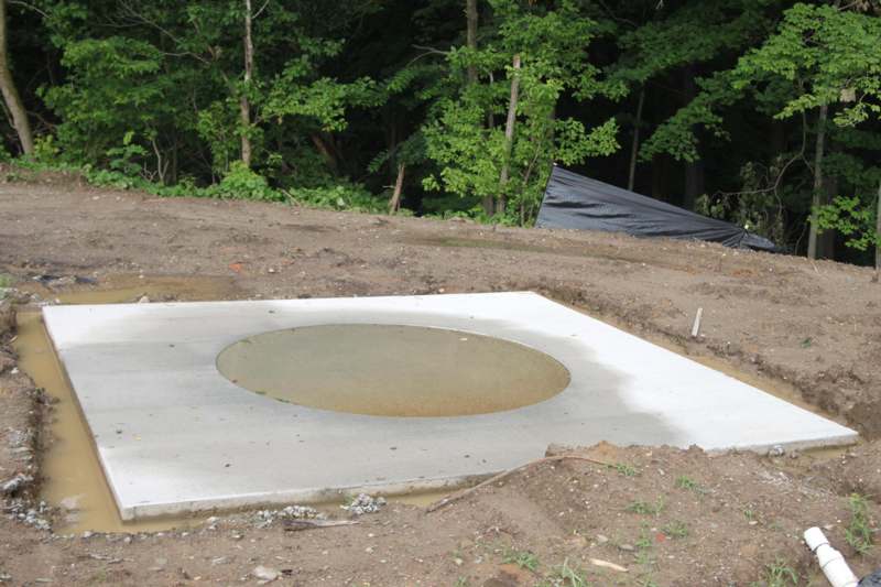 a concrete circle with a hole in it