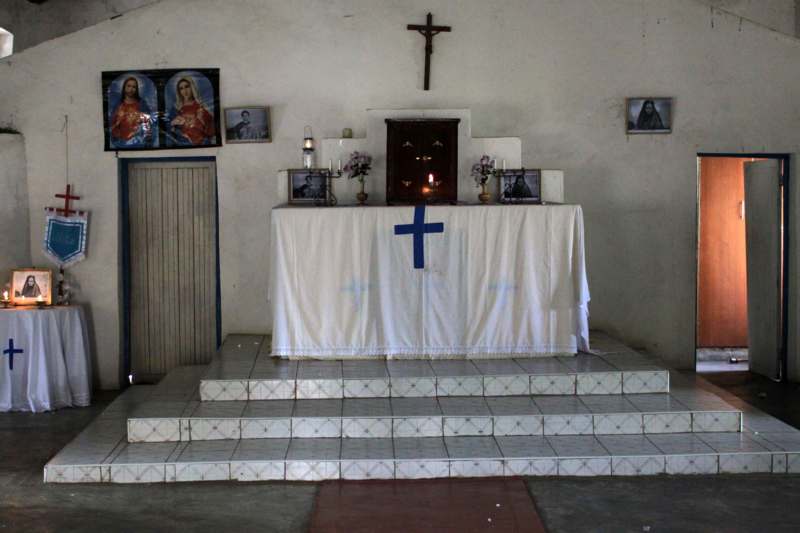 a white table with a blue cross on it