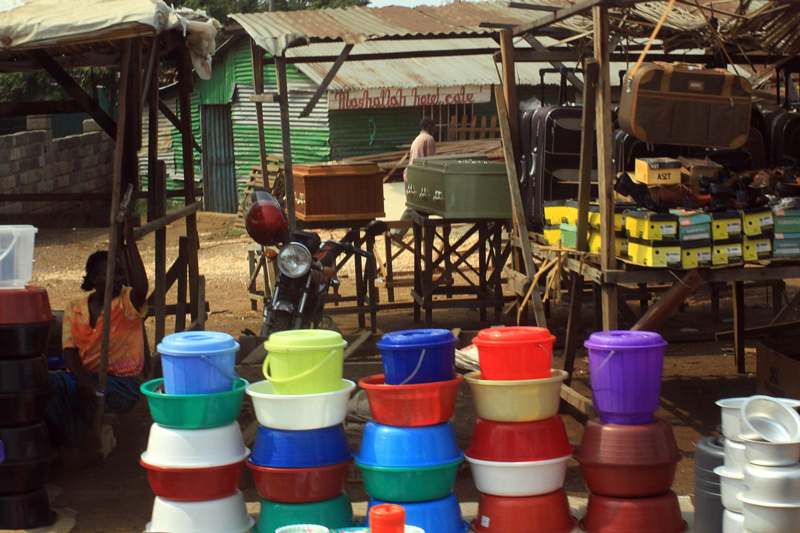 a group of colorful plastic buckets