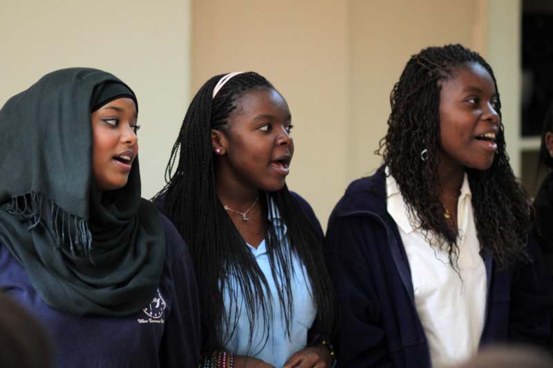 a group of young women singing
