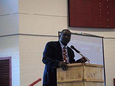 a man standing at a podium
