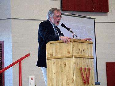 a man speaking into a microphone