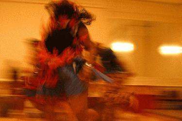 a blurry image of a woman dancing