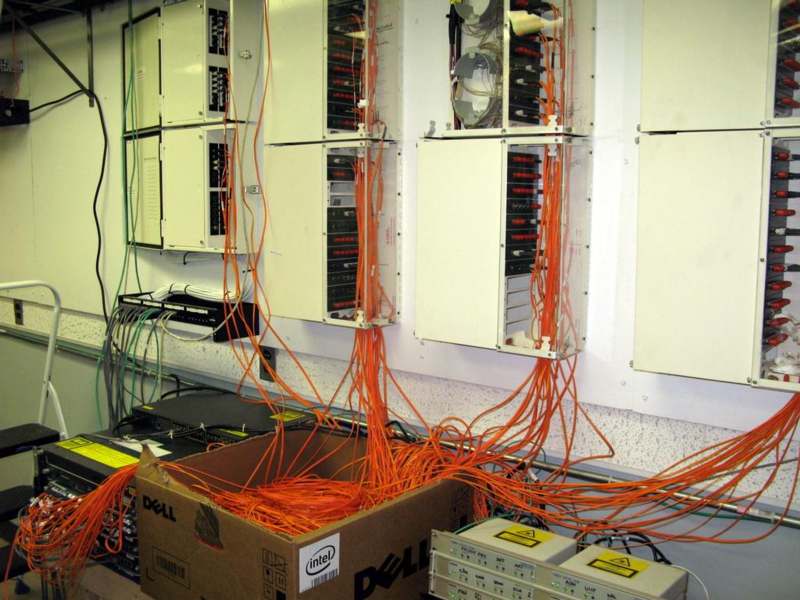 a bunch of orange wires in a room