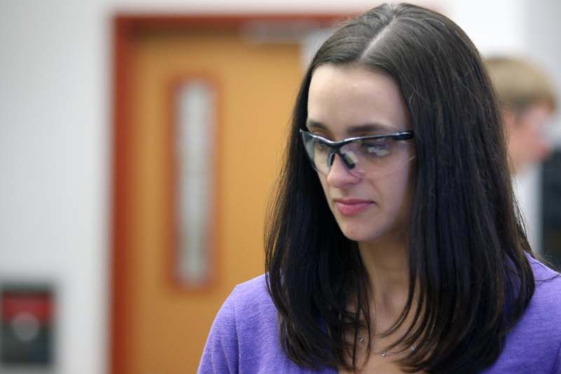 a woman wearing safety glasses