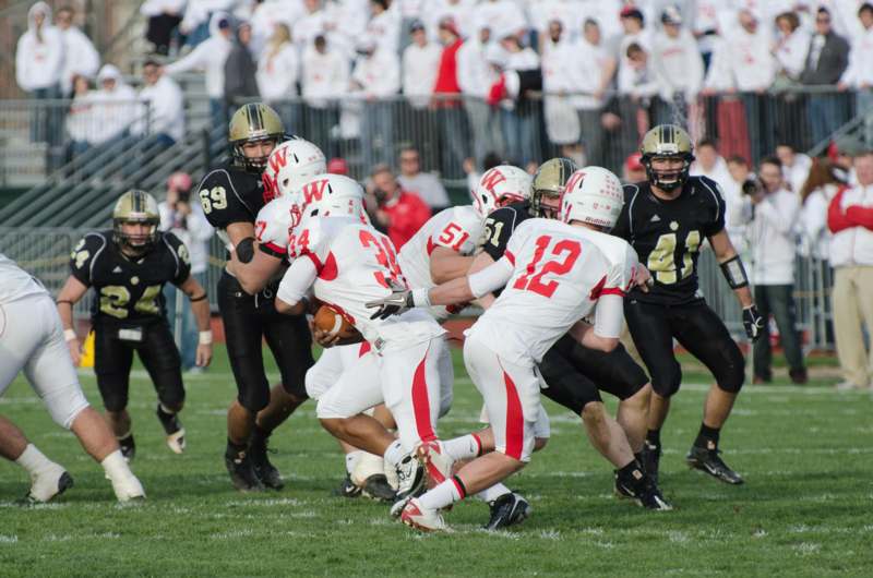 a group of football players on a field