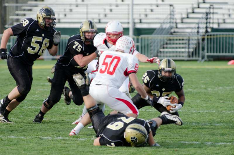 a group of football players on a field