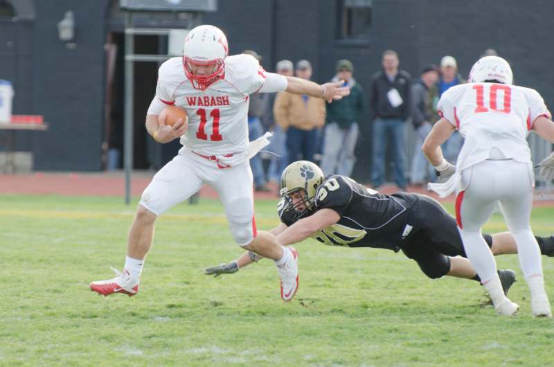 a football player running with the ball