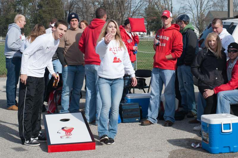 a group of people standing around a game
