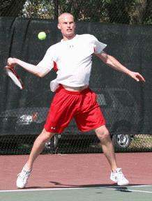 a man playing tennis