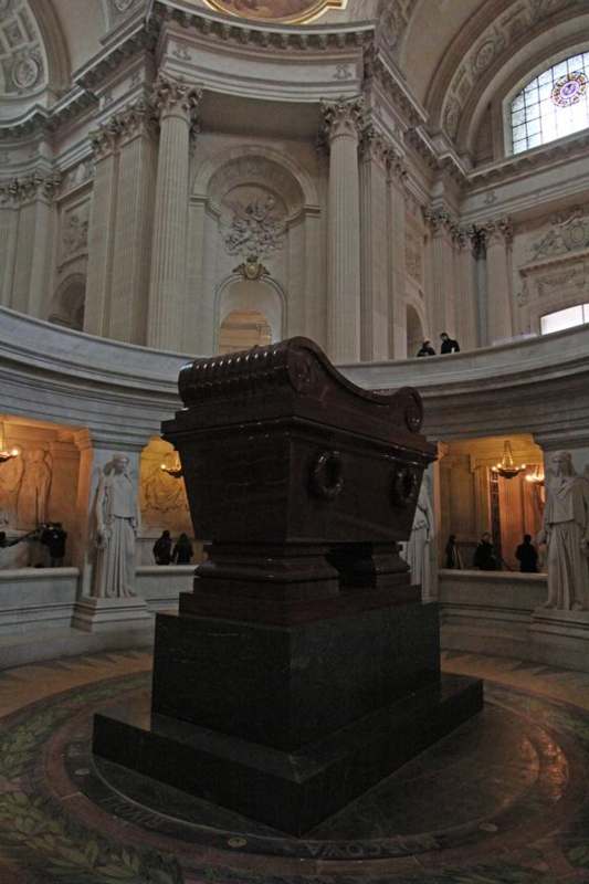 a large stone casket in a large room