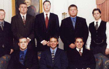 a group of men in suits