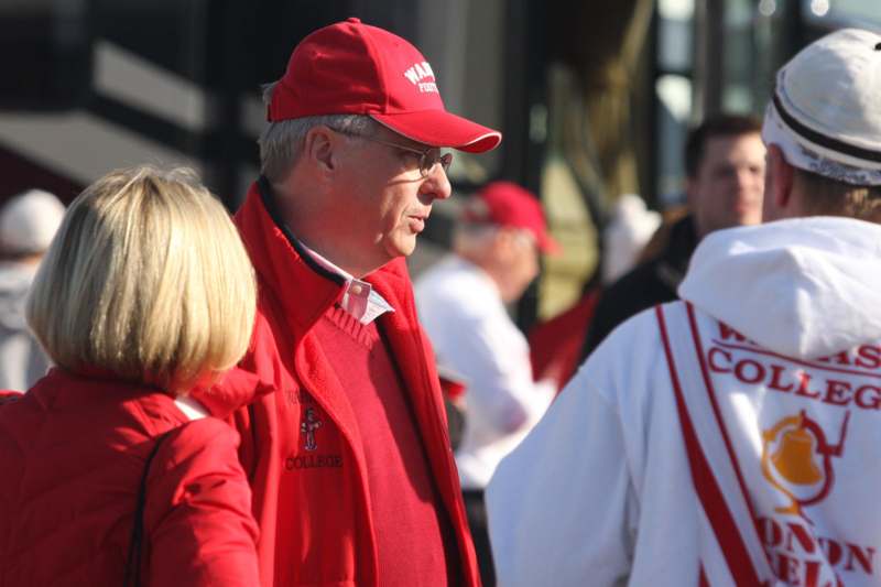 a man in red jacket and hat