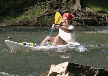 a man in a white kayak