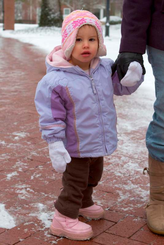 a child in a winter coat