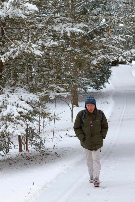 a man walking in the snow