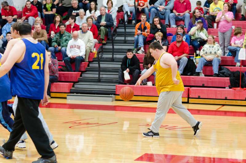 a man dribbling a basketball