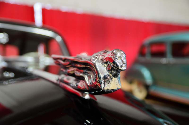 a close up of a car hood ornament