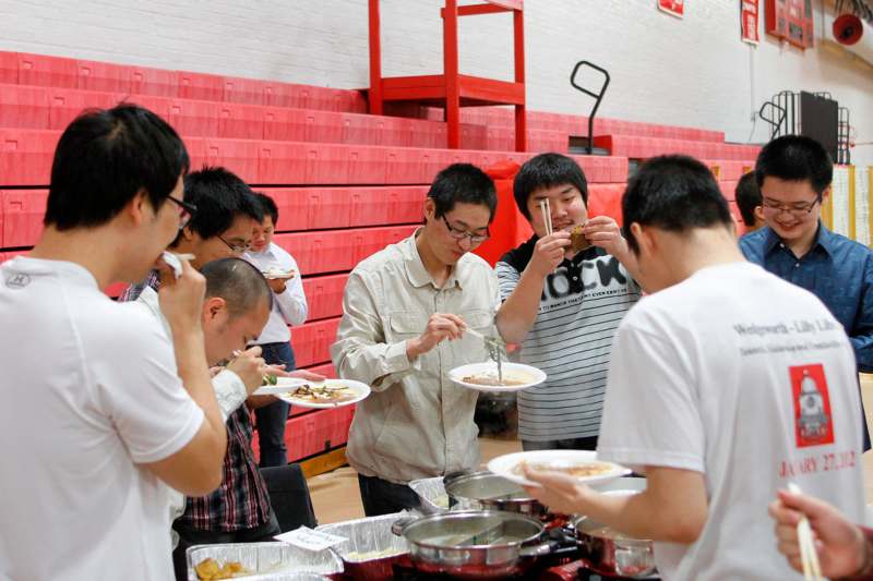 a group of people eating food