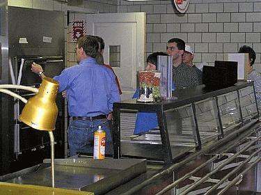 a group of people in a restaurant