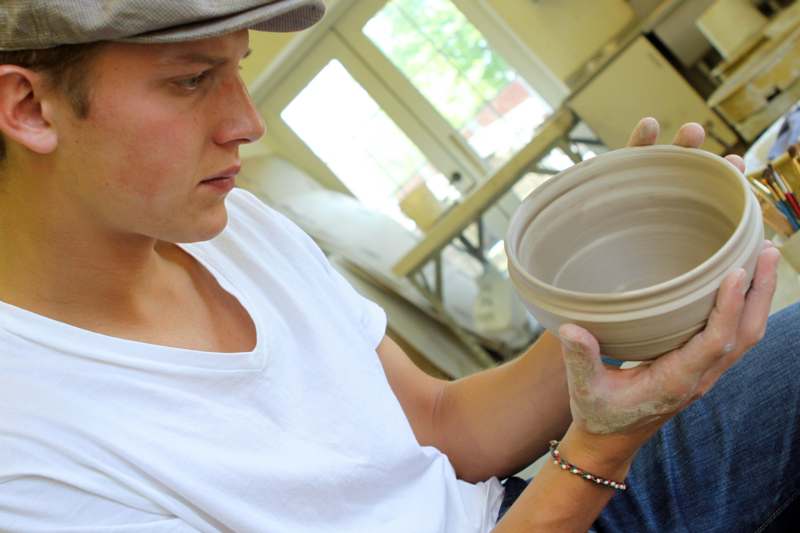 a man holding a bowl