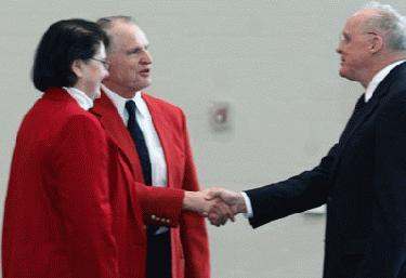 a man and woman shaking hands