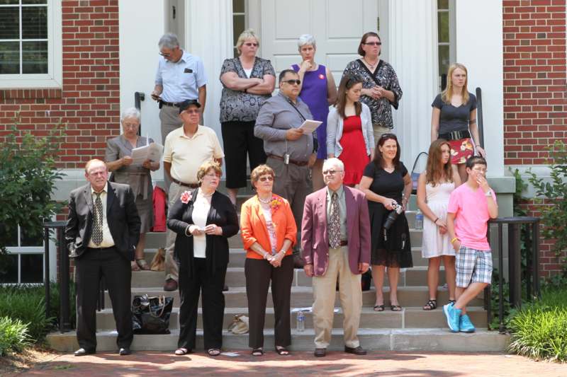 a group of people standing on steps