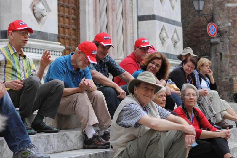 a group of people sitting on steps